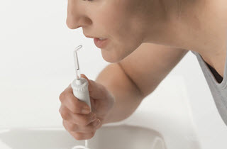 Impara come usare un Waterpik® Water Flosser